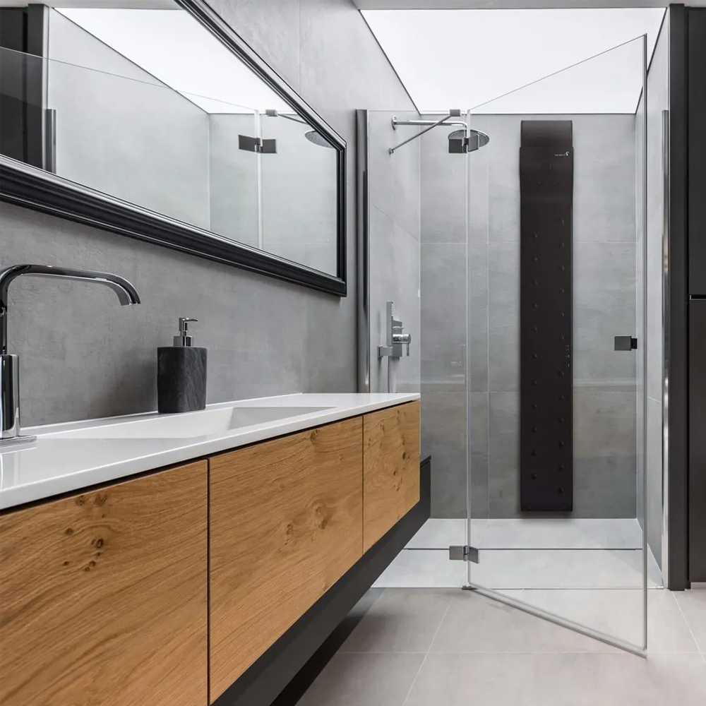 Discover the Valiryo Body Dryer – an innovative, fully automated drying device that replaces towels with a skin-nourishing, antibacterial air stream. Easily installable inside or outside the shower, it offers uniform drying from head to toe in three minutes. With 27 air diffusers, adjustable temperature and intensity, and a motion sensor, it ensures a hygienic, relaxing experience. Ideal for wellness, limited mobility, and skin care. Request a quote today!